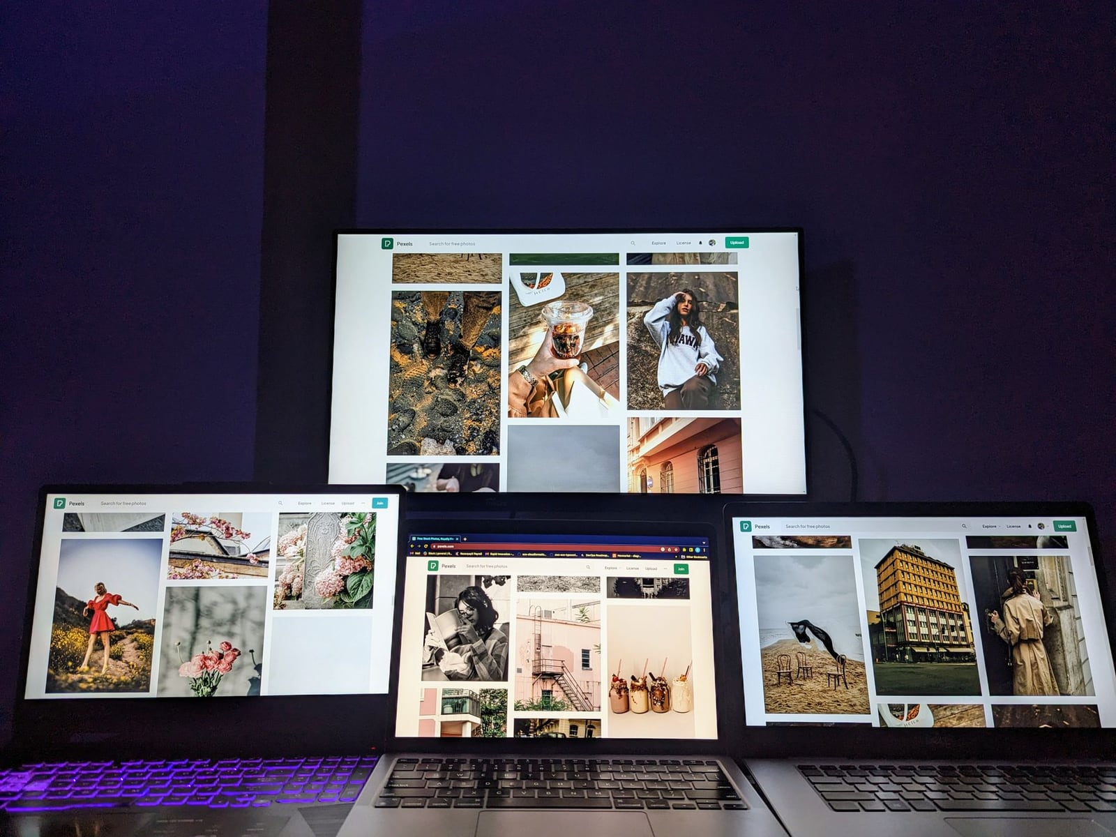 Multiple screens showing different video aspect ratios in a studio setting